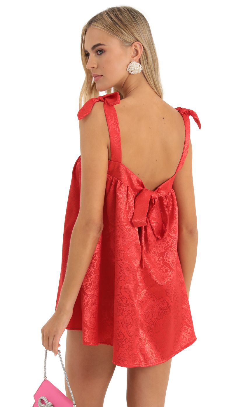Picture Jacquard Shift Dress in Red. Source: https://media-img.lucyinthesky.com/data/Dec22/850xAUTO/c44ca719-7586-4726-aad2-39357b9e251a.jpg