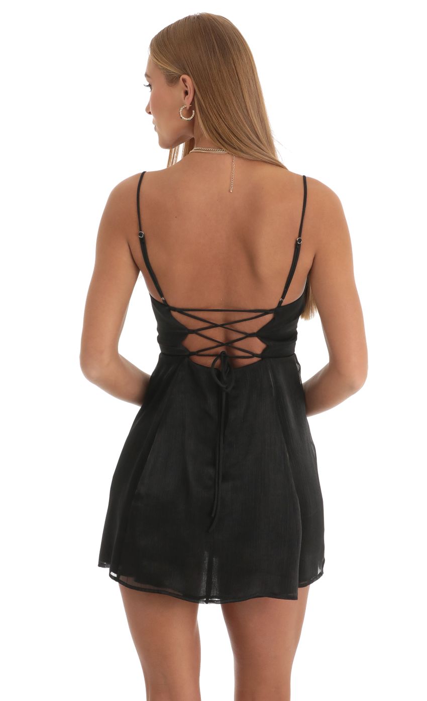 Picture Shiny Crinkle A-line Dress in Black. Source: https://media-img.lucyinthesky.com/data/Dec22/850xAUTO/c49f5f0e-8466-450c-8b91-a31859b8bacd.jpg