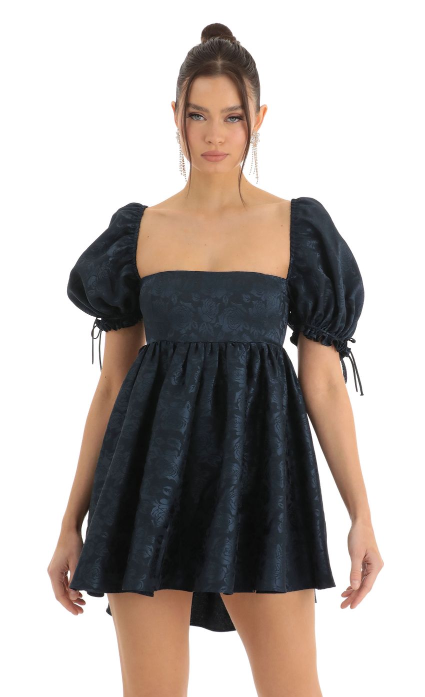 Picture Floral Jacquard Baby Dolly Dress in Navy. Source: https://media-img.lucyinthesky.com/data/Dec22/850xAUTO/c7aab2ef-5fed-4ab1-91fe-e0b71f11f527.jpg