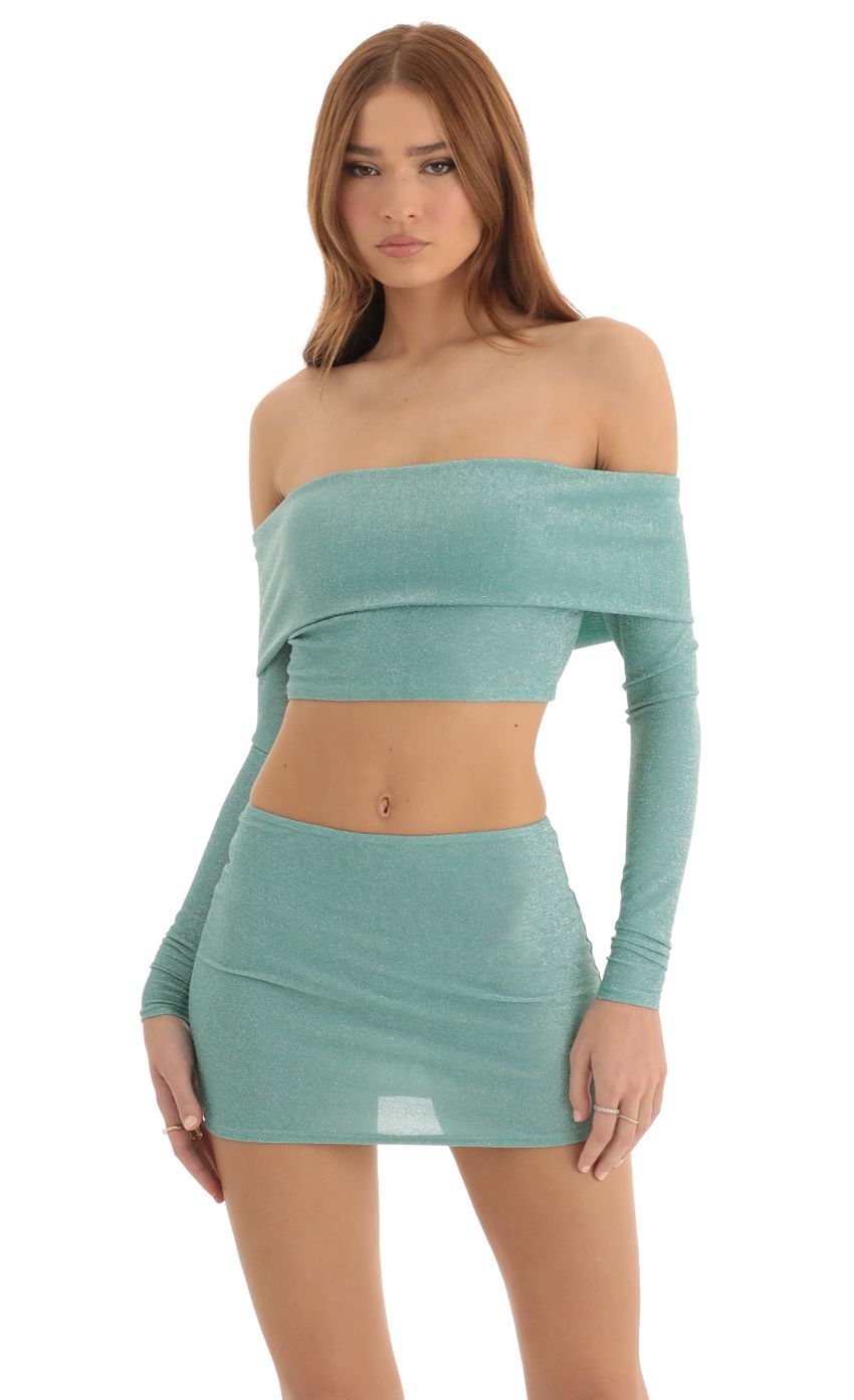 Picture Metallic Knit Two Piece Skirt Set in Turquoise. Source: https://media-img.lucyinthesky.com/data/Dec22/850xAUTO/caba9e19-1fe7-43ef-ba90-d018f14b9305.jpg