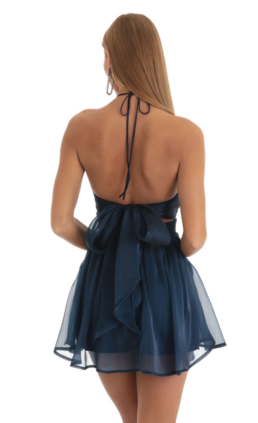 Picture Halter Cutout Dress in Navy. Source: https://media-img.lucyinthesky.com/data/Dec22/850xAUTO/cbc774b5-db80-4c0a-a12e-13f3400c7aa9.jpg