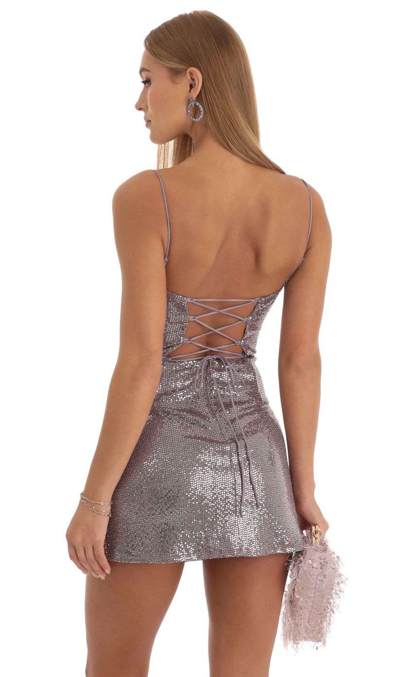 Picture Knit Sequin Side Slit Dress in Purple. Source: https://media-img.lucyinthesky.com/data/Dec22/850xAUTO/d551915c-ba7a-440c-94e0-6c456801c58a.jpg