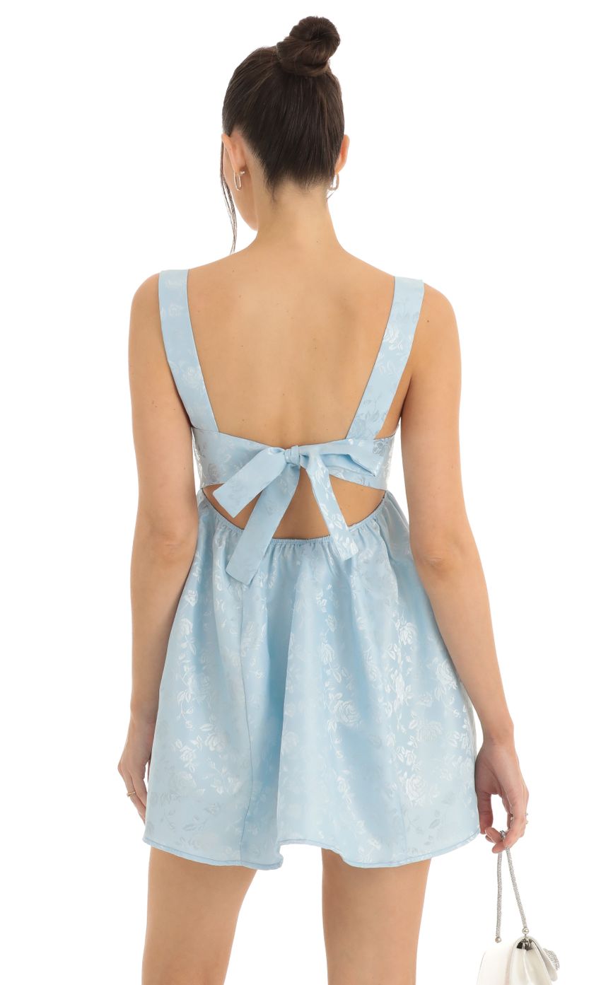 Picture Floral Jacquard Fit and Flare Dress in Blue. Source: https://media-img.lucyinthesky.com/data/Dec22/850xAUTO/d56fae85-c52a-43db-960a-01a78c85c711.jpg