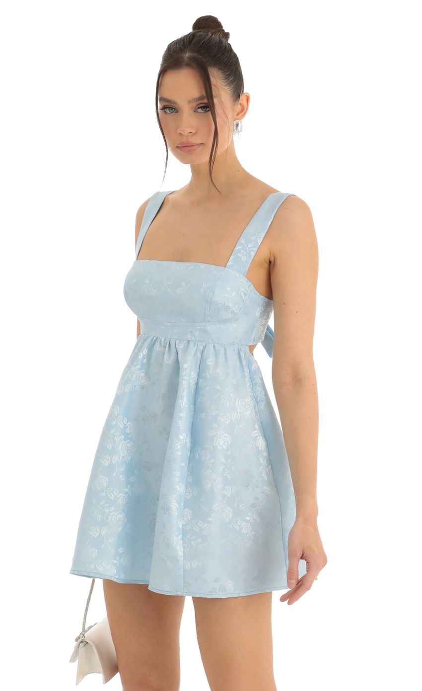 Picture Floral Jacquard Fit and Flare Dress in Blue. Source: https://media-img.lucyinthesky.com/data/Dec22/850xAUTO/d680dcc1-75b2-41fa-8850-b17f87150e37.jpg