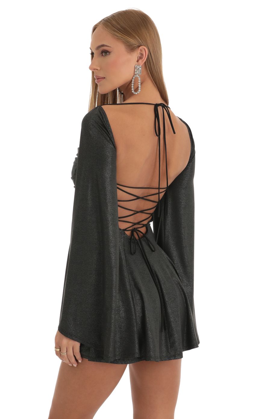 Picture Foil Flare Sleeve Dress in Black. Source: https://media-img.lucyinthesky.com/data/Dec22/850xAUTO/e3ce8fda-cbf2-4e39-b317-e7f14819d605.jpg