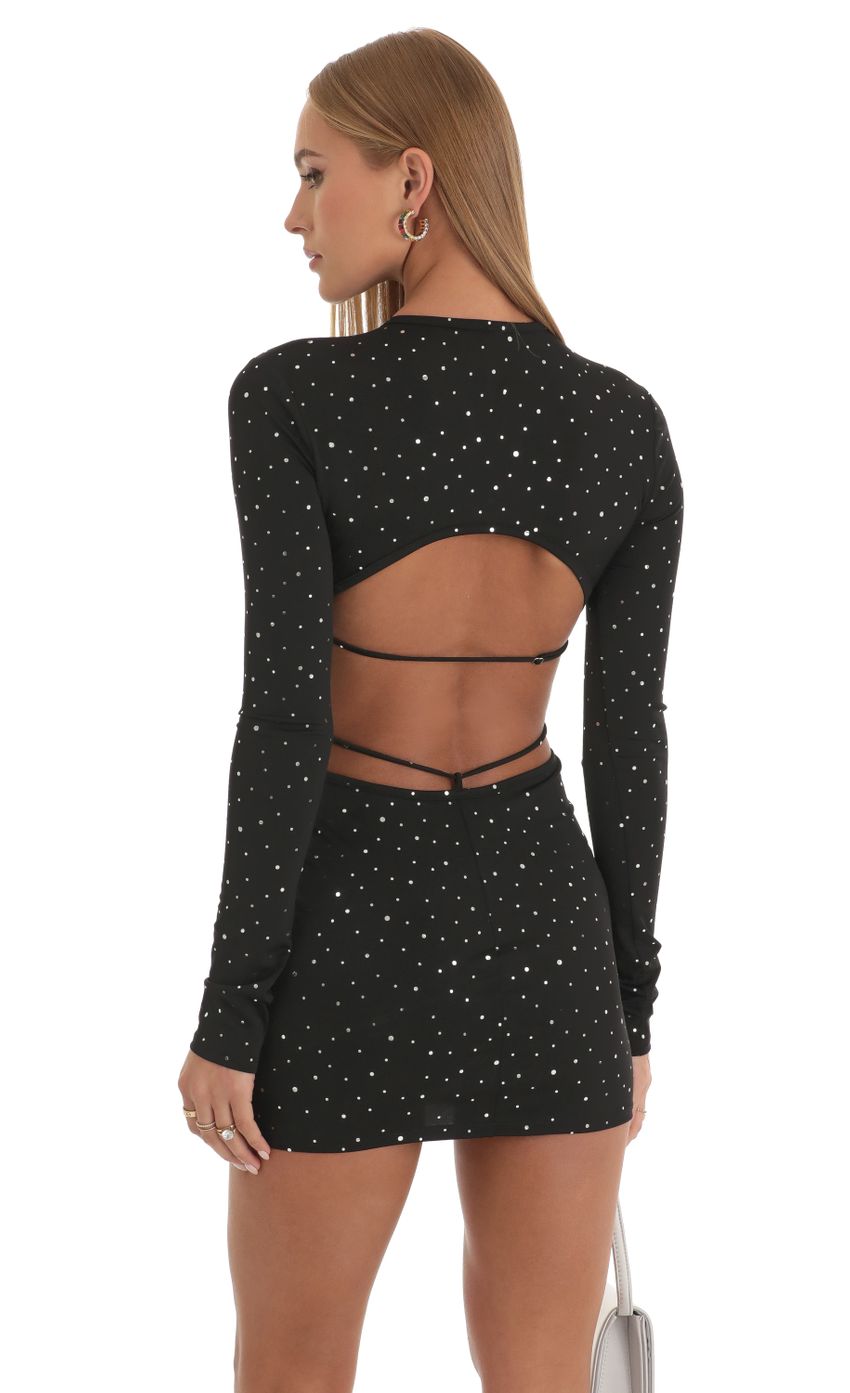 Picture Shimmer Cutout Open Back Dress in Black. Source: https://media-img.lucyinthesky.com/data/Dec22/850xAUTO/e72f282f-0a12-4c33-a5e3-dbb5dfe89336.jpg