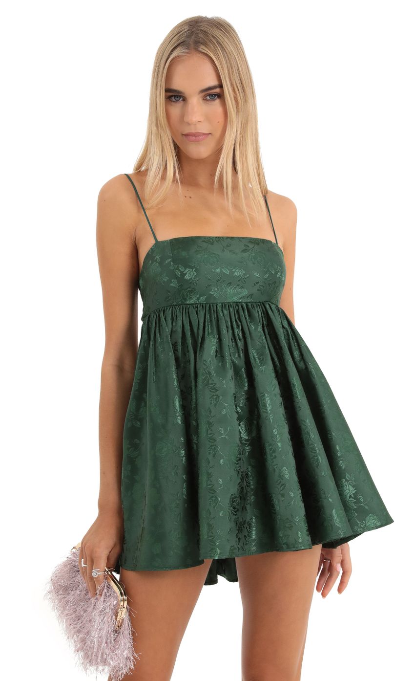 Picture Floral Jacquard Baby Doll Dress in Green. Source: https://media-img.lucyinthesky.com/data/Dec22/850xAUTO/e812f4c5-f0e8-4397-9a17-f6feea73926a.jpg