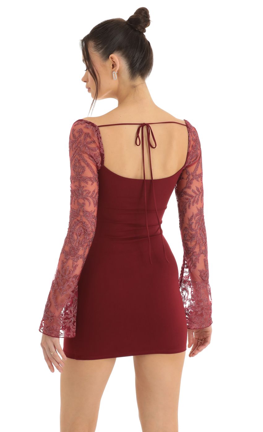Picture Tulle Embroidered Long Sleeve Bodycon Dress in Red. Source: https://media-img.lucyinthesky.com/data/Dec22/850xAUTO/e8b9f137-acfb-45b7-b3e5-a08f96f9012c.jpg