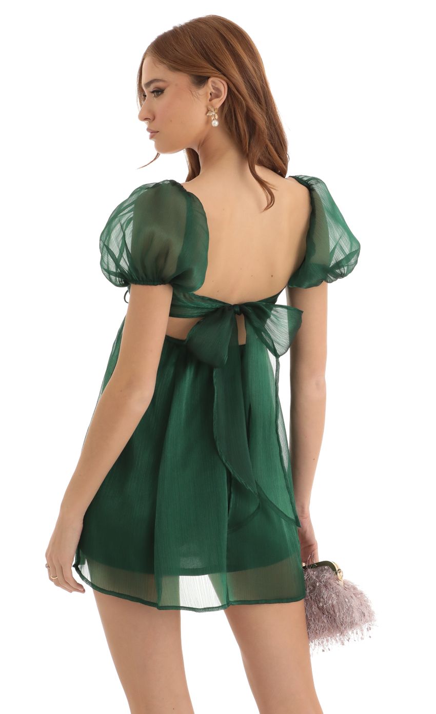 Picture Elexia Puff Sleeve Baby Doll Dress in Green. Source: https://media-img.lucyinthesky.com/data/Dec22/850xAUTO/f4ed86f6-e1cf-47be-afeb-cfaf9786b3f4.jpg