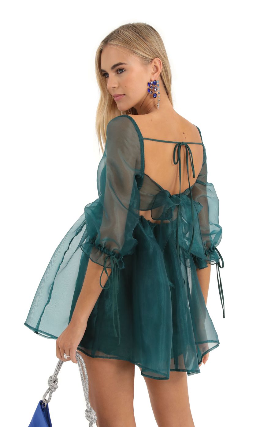 Picture Puff Sleeve Baby Doll Dress in Green. Source: https://media-img.lucyinthesky.com/data/Dec22/850xAUTO/f56512ac-f7f4-4552-a78d-9dd65e70a987.jpg