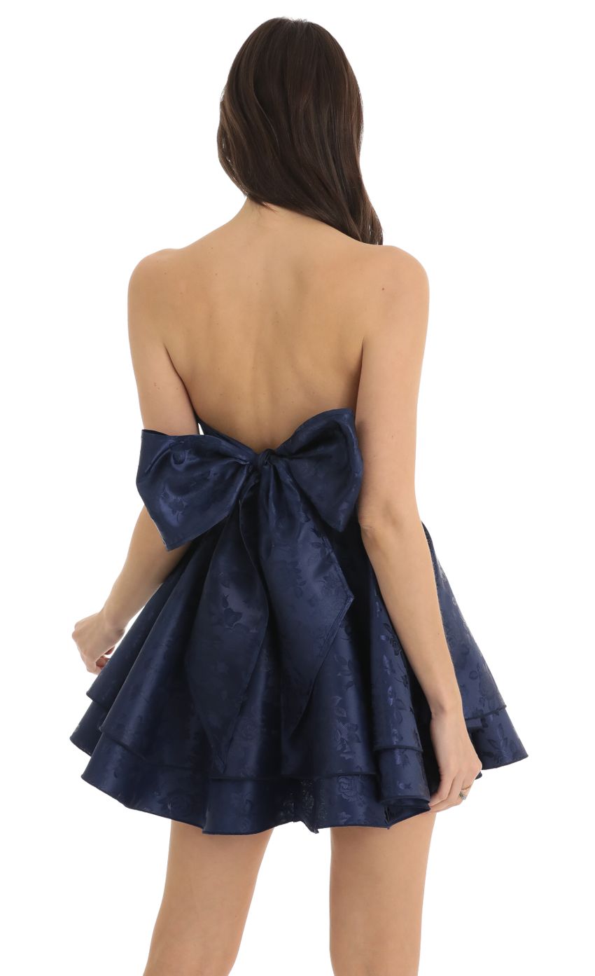 Picture Floral Jacquard Dress in Navy. Source: https://media-img.lucyinthesky.com/data/Dec22/850xAUTO/fbd77941-1b42-4c24-b046-12bf833c1d8c.jpg