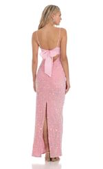 Picture Velvet Sequin Back Bow Maxi Dress in Pink. Source: https://media-img.lucyinthesky.com/data/Dec23/150xAUTO/1ecf88f9-58f8-4a5e-a564-0f7bdb4ba0e8.jpg
