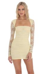 Picture Lace Long Sleeve Bodycon in Yellow. Source: https://media-img.lucyinthesky.com/data/Dec23/150xAUTO/2d895c9e-45ed-4fda-9247-c19067f65d6a.jpg