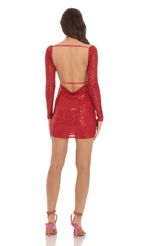 Picture Sequin Long Sleeve Open Back Bodycon Dress in Red. Source: https://media-img.lucyinthesky.com/data/Dec23/150xAUTO/548aaa4f-c2fc-48f0-8ced-e8dbb05cf859.jpg