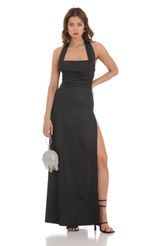 Picture Shimmer Halter Maxi Dress in Black. Source: https://media-img.lucyinthesky.com/data/Dec23/150xAUTO/b1dc5d56-41e5-4f2e-82f9-dab24d4ea4fd.jpg