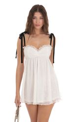 Picture High Low Overlay Dress in White. Source: https://media-img.lucyinthesky.com/data/Dec23/150xAUTO/b264d349-b8cd-4446-b403-2ef61dd2d5fe.jpg