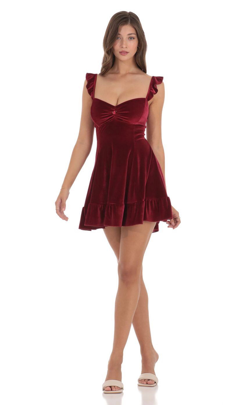 Picture Velvet Ruffle Strap A-Line Dress in Maroon. Source: https://media-img.lucyinthesky.com/data/Dec23/850xAUTO/006ea200-f143-43ae-977e-110e494adab5.jpg