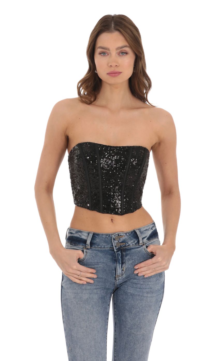 Picture Sequin Strapless Corset Top in Black. Source: https://media-img.lucyinthesky.com/data/Dec23/850xAUTO/01d1308b-bf0d-482f-b70a-4a8815fe02cf.jpg