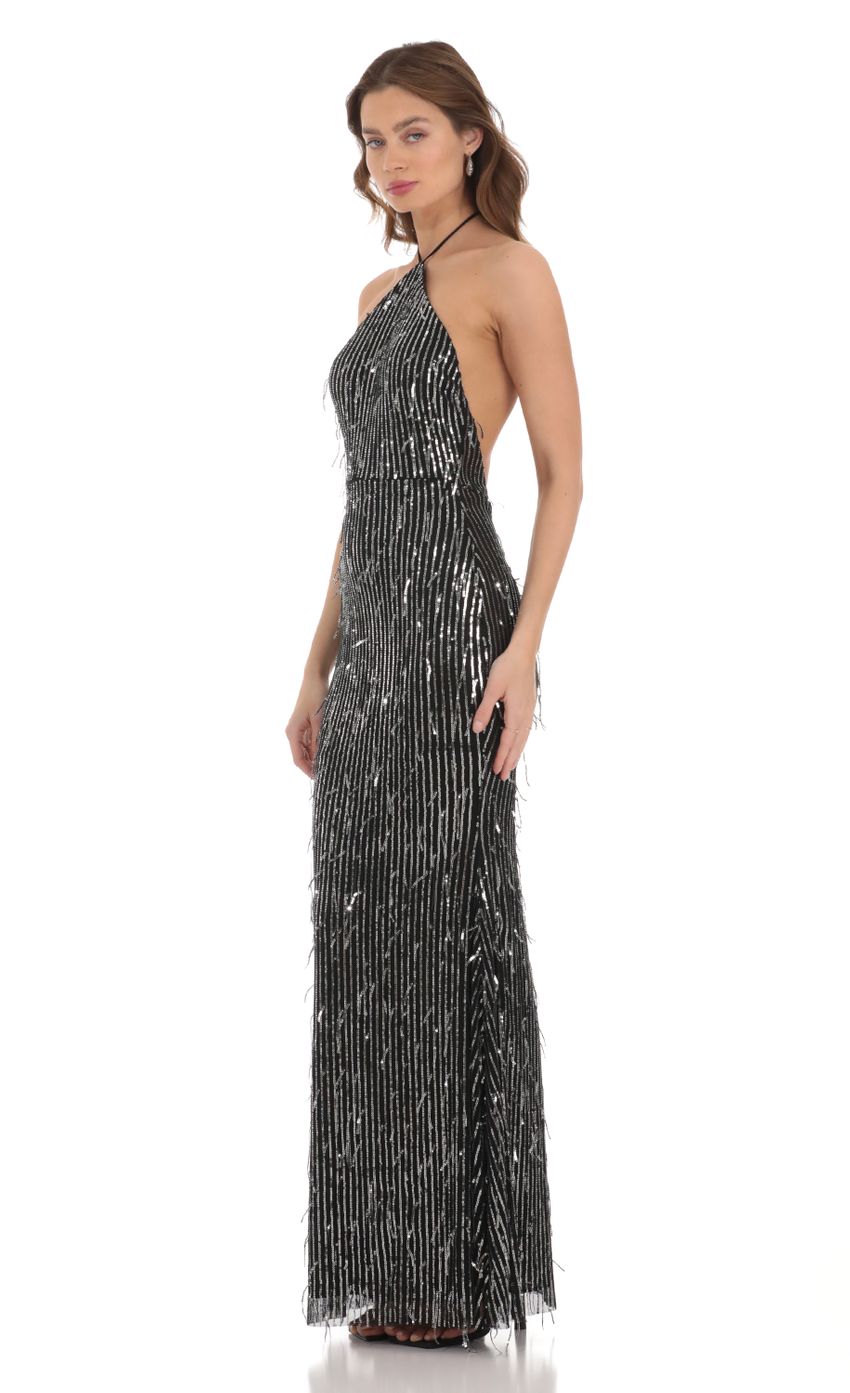 Picture Silver Fringe Sequin Halter Maxi Dress in Black. Source: https://media-img.lucyinthesky.com/data/Dec23/850xAUTO/0a19ad8e-5e05-42c7-bfce-b2522dd281e0.jpg