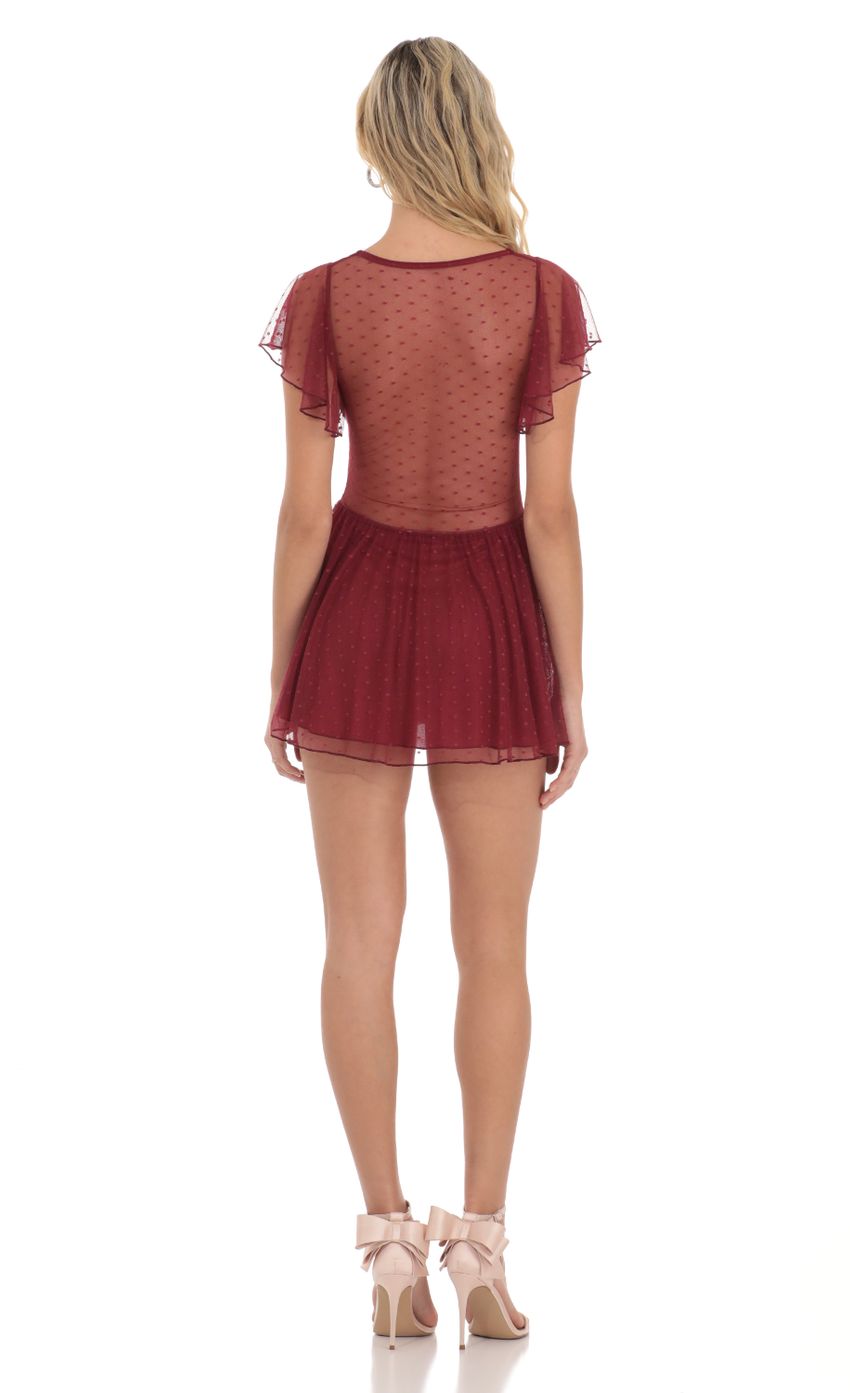 Picture Dotted Mesh Cutout Dress in Maroon. Source: https://media-img.lucyinthesky.com/data/Dec23/850xAUTO/1c265fef-430f-4ce3-b476-7cf3b03a58a3.jpg