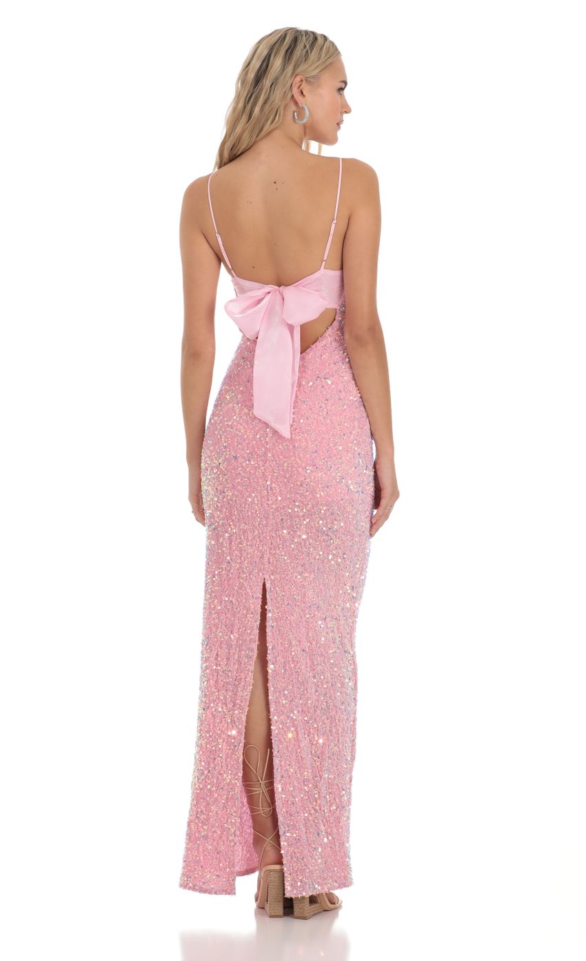 Picture Velvet Sequin Back Bow Maxi Dress in Pink. Source: https://media-img.lucyinthesky.com/data/Dec23/850xAUTO/1ecf88f9-58f8-4a5e-a564-0f7bdb4ba0e8.jpg