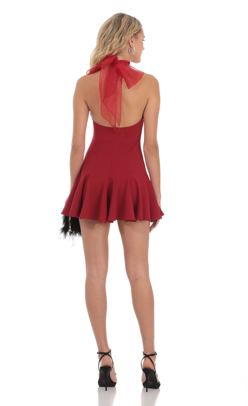Picture Mock Neck Halter Flare Dress in Red. Source: https://media-img.lucyinthesky.com/data/Dec23/850xAUTO/21ce646a-d6f3-4bb1-b8b1-df9a8183f57a.jpg