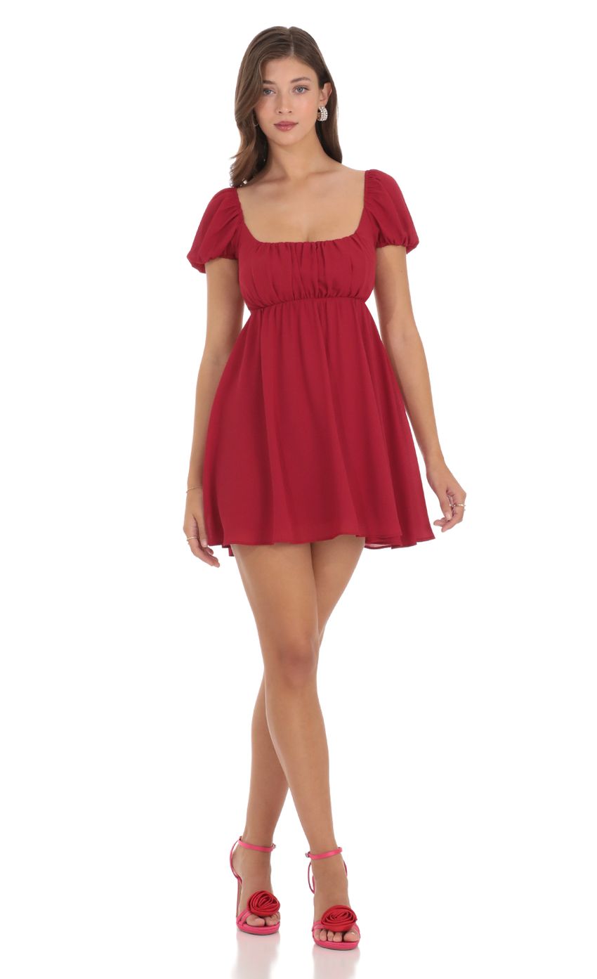 Picture Puff Sleeve Babydoll Dress in Red. Source: https://media-img.lucyinthesky.com/data/Dec23/850xAUTO/238a1a5c-26c5-4184-9dbe-4e1fd9734249.jpg