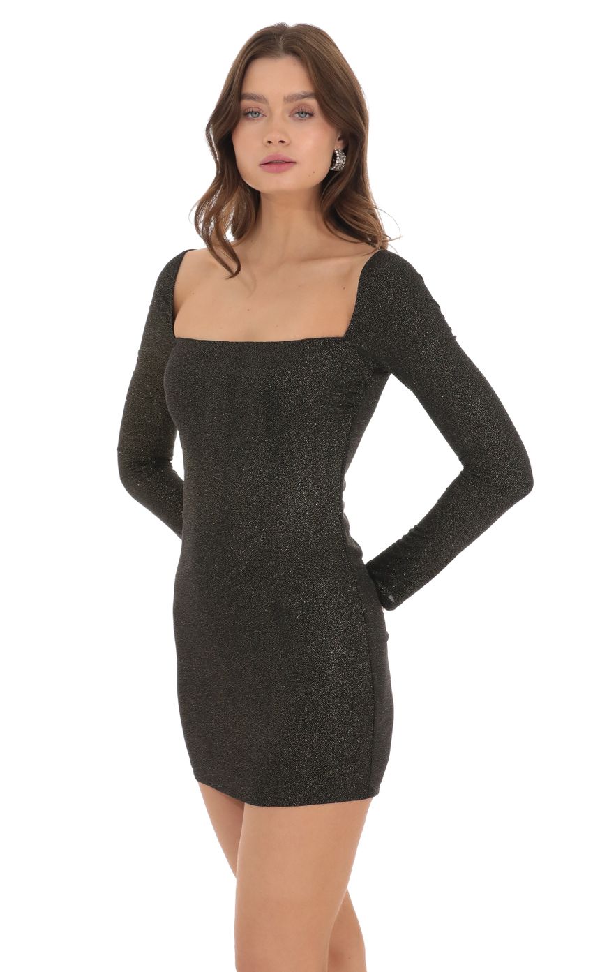 Picture Shimmer Long Sleeve Dress in Black. Source: https://media-img.lucyinthesky.com/data/Dec23/850xAUTO/31ae1025-55a8-4c4d-bd6c-bef5dd424472.jpg