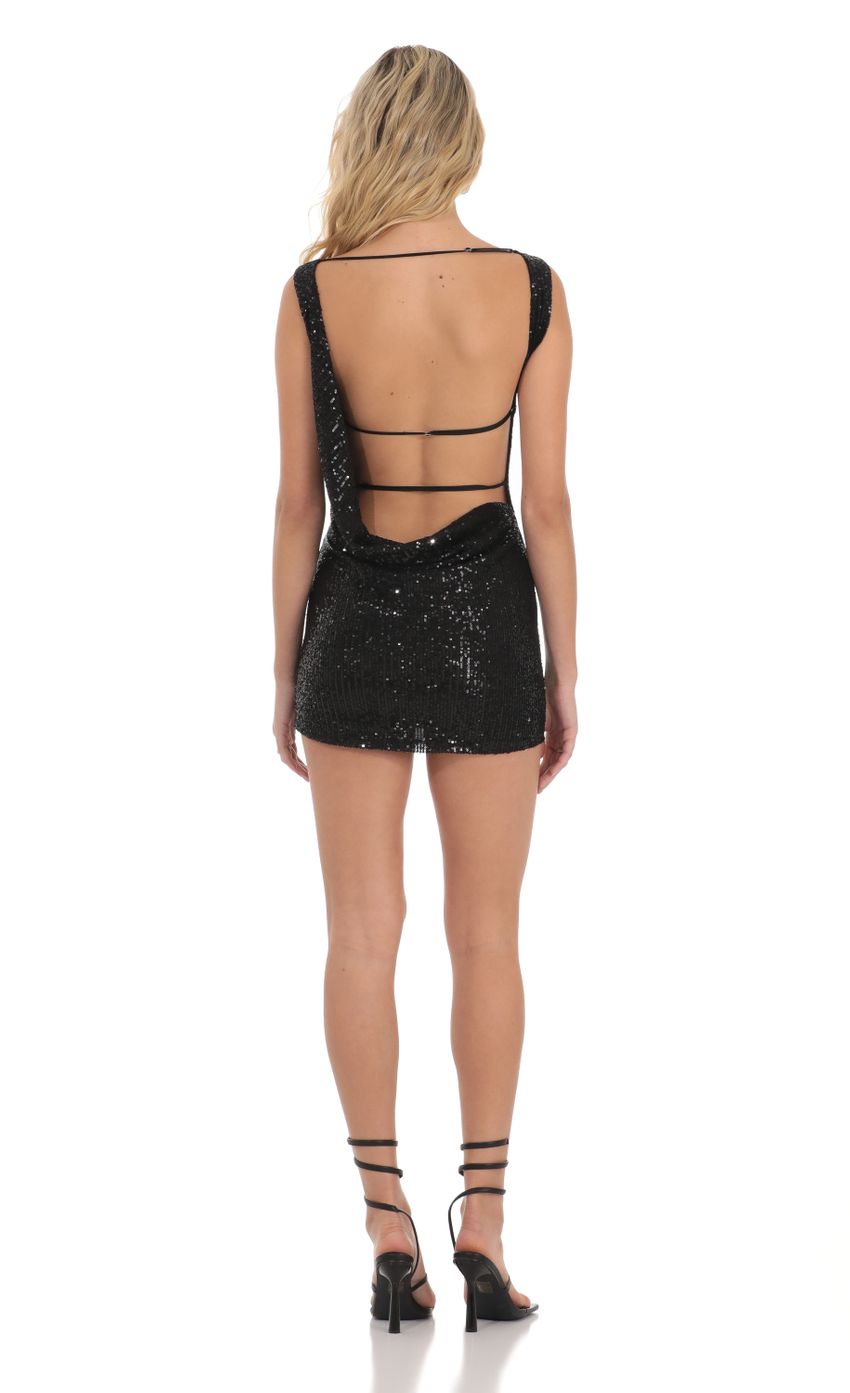 Picture Sequin High Neck Open Back Dress in Black. Source: https://media-img.lucyinthesky.com/data/Dec23/850xAUTO/42493443-ae90-4bf4-83e2-a73096595bca.jpg