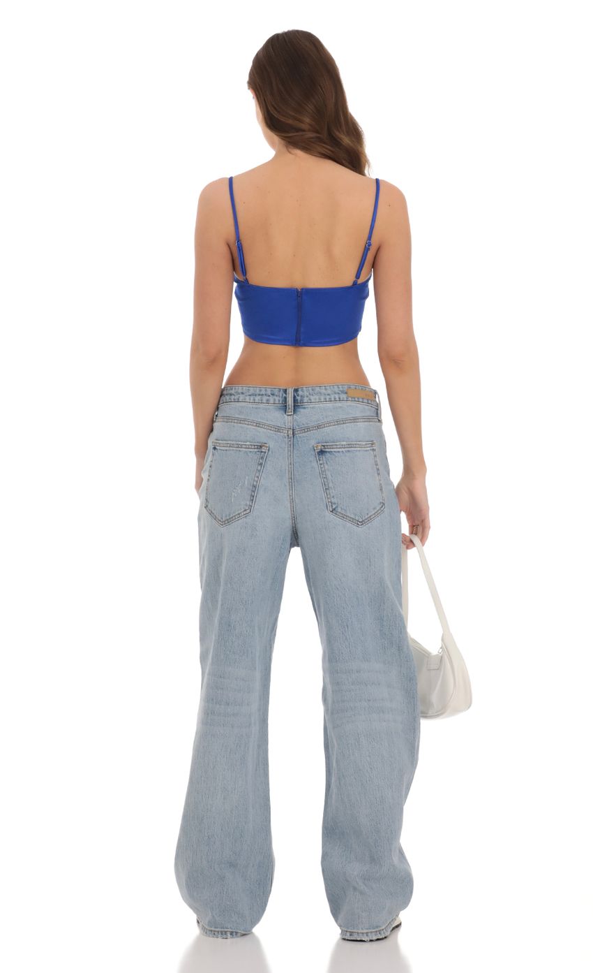 Picture Satin Corset Crop Top in Royal Blue. Source: https://media-img.lucyinthesky.com/data/Dec23/850xAUTO/443aee34-6d57-43c1-bad1-b5953a8b5499.jpg