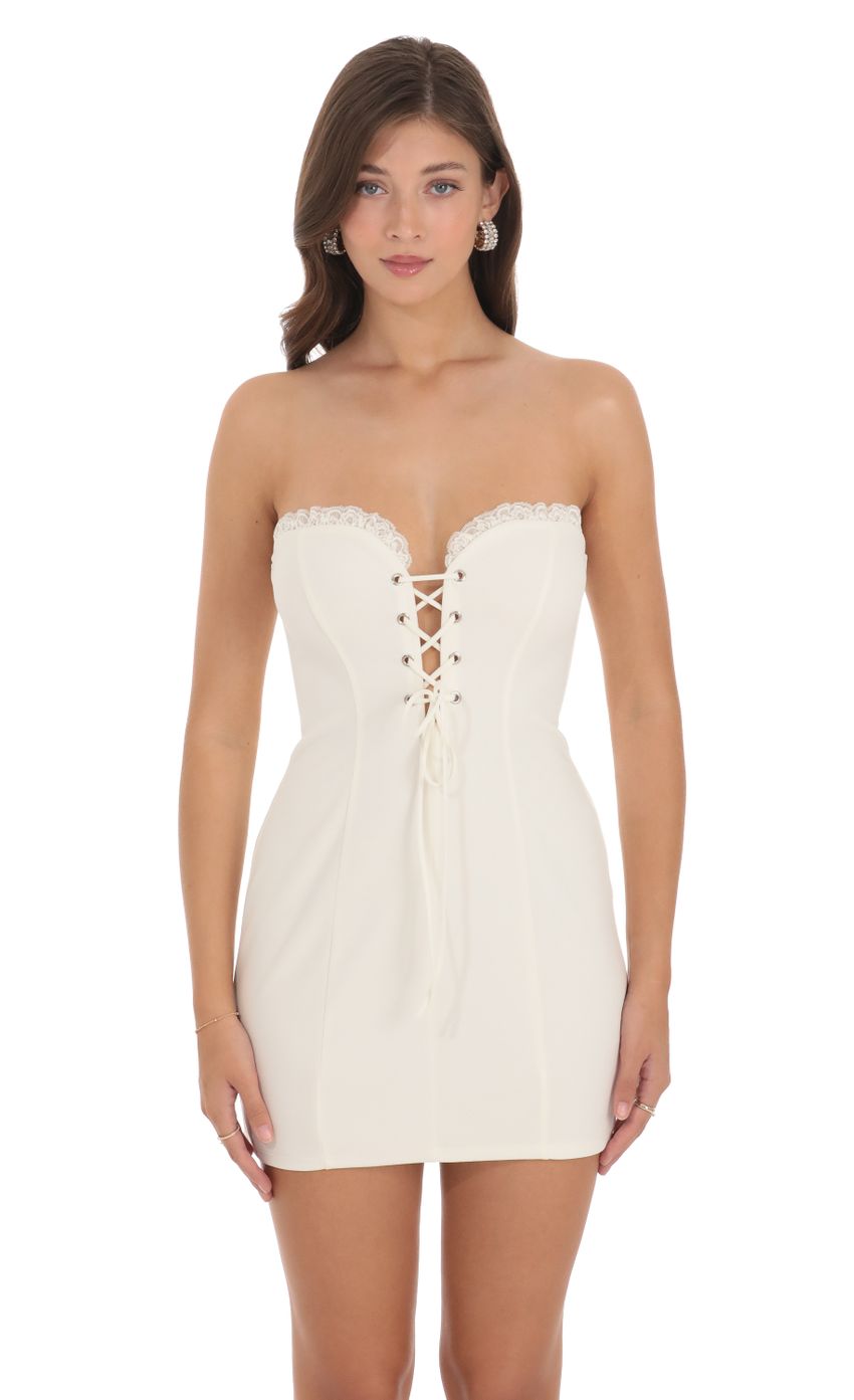 Picture Lace Strapless Lace Up Dress in Ivory. Source: https://media-img.lucyinthesky.com/data/Dec23/850xAUTO/48c3f4d2-a73f-46ed-8366-b42e94c35156.jpg