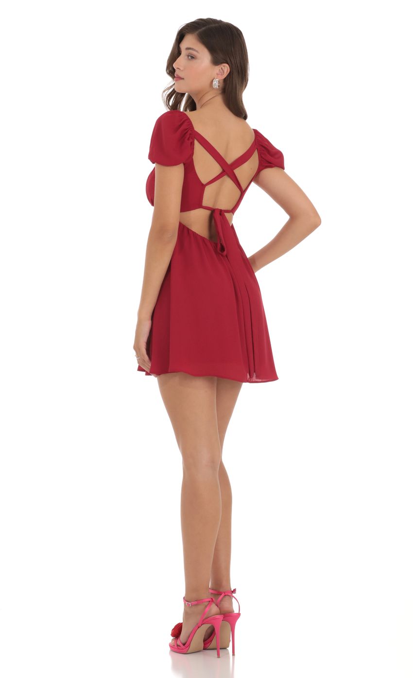 Picture Puff Sleeve Babydoll Dress in Red. Source: https://media-img.lucyinthesky.com/data/Dec23/850xAUTO/51c3e364-e28e-40fd-8379-a1342a8c03bb.jpg