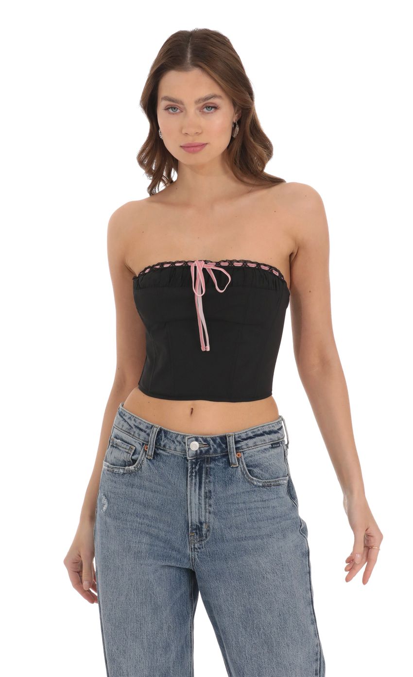 Picture Velvet Ribbon Strapless Corset Top in Black. Source: https://media-img.lucyinthesky.com/data/Dec23/850xAUTO/582dacf2-31cd-411d-9dd0-260006f339ca.jpg