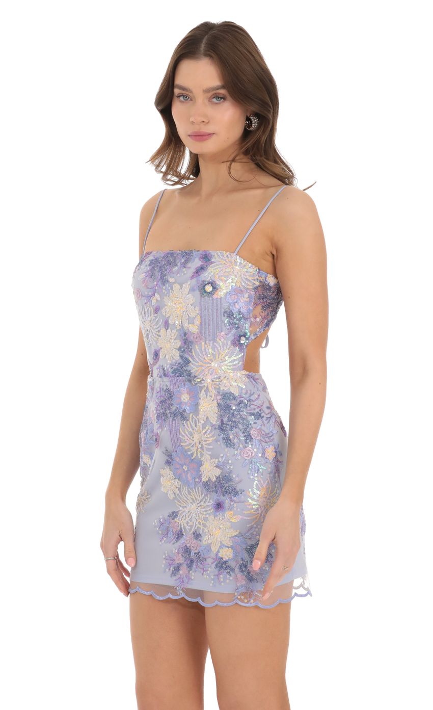 Picture Floral Sequin Open Back Dress in Periwinkle. Source: https://media-img.lucyinthesky.com/data/Dec23/850xAUTO/67536809-79e7-4585-8e02-36af8dcb5ae3.jpg