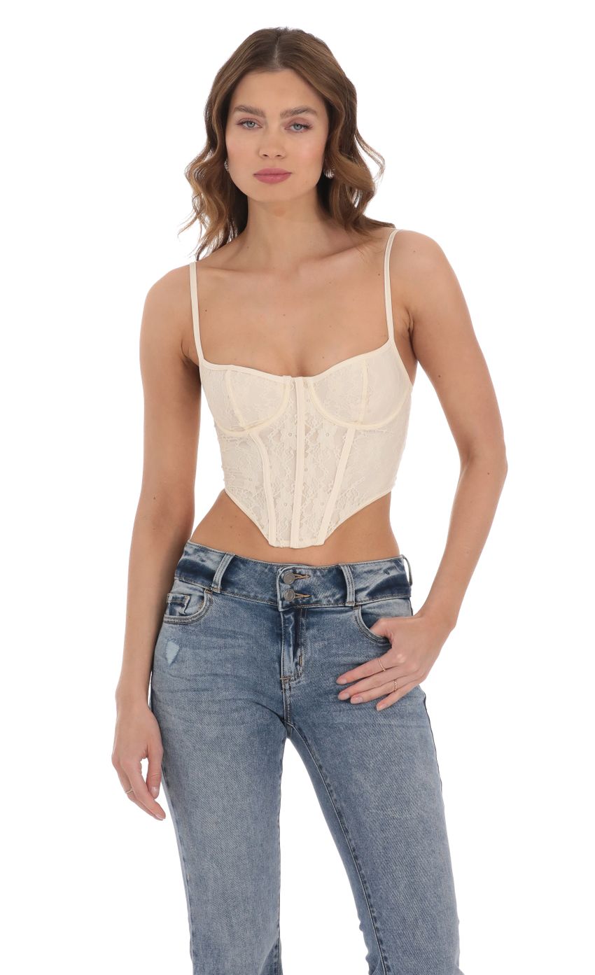 Picture Lace Corset Top in Cream. Source: https://media-img.lucyinthesky.com/data/Dec23/850xAUTO/80c2a096-abc1-44ce-833d-33b65b8ed34a.jpg