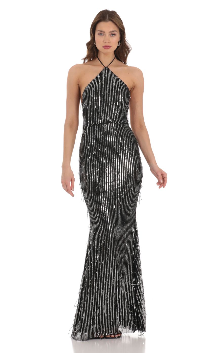 Picture Silver Fringe Sequin Halter Maxi Dress in Black. Source: https://media-img.lucyinthesky.com/data/Dec23/850xAUTO/9fdbb74d-a7c8-4ad0-b783-deeb67bff545.jpg