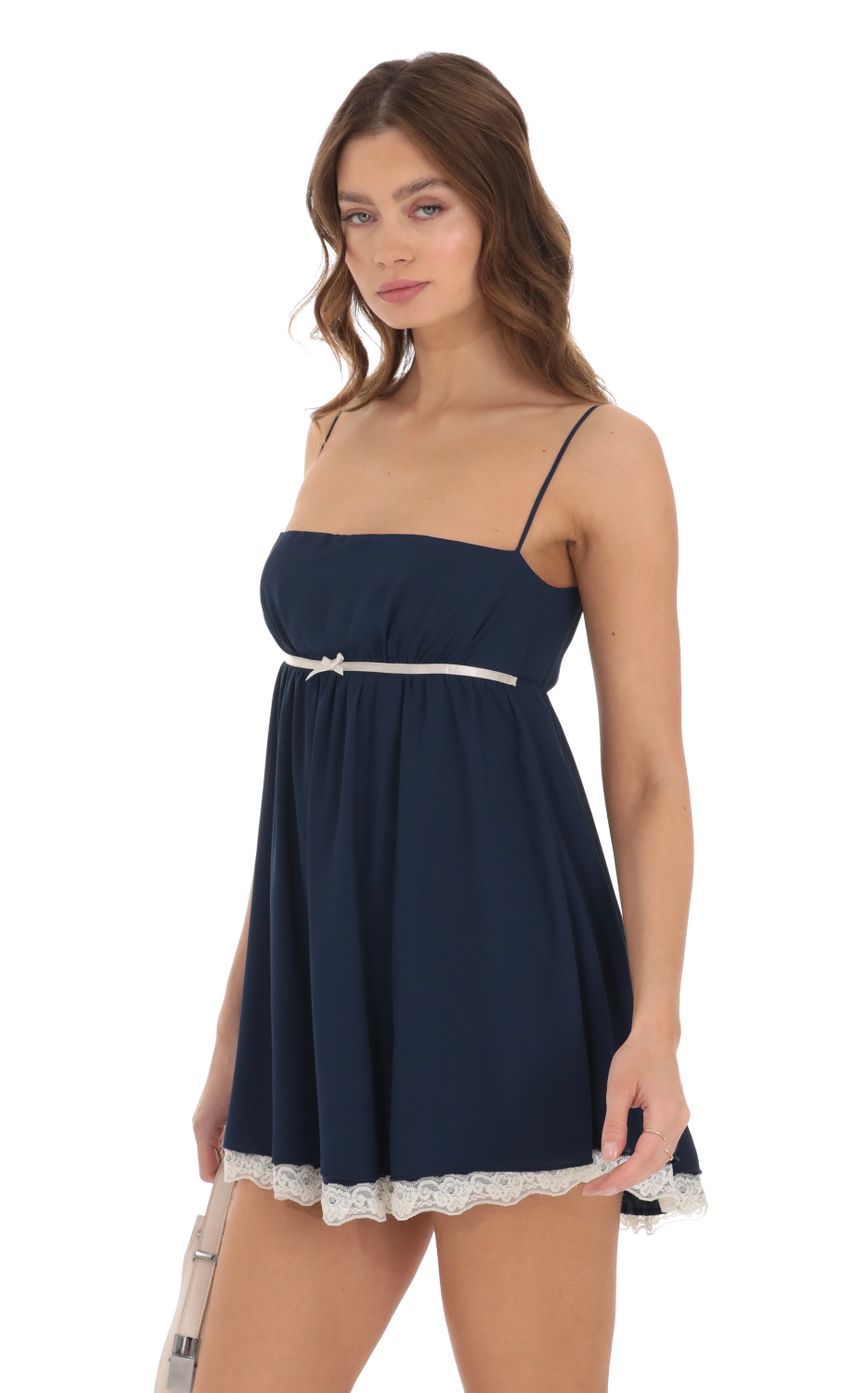 Picture Lace Hem Babydoll Dress in Navy. Source: https://media-img.lucyinthesky.com/data/Dec23/850xAUTO/bb6e87e1-4e4f-4fd7-825a-9b0af08f1ce7.jpg
