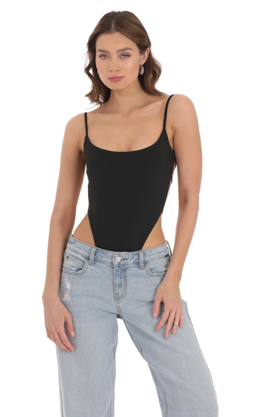 Picture Open Back Strappy Bodysuit in Black. Source: https://media-img.lucyinthesky.com/data/Dec23/850xAUTO/c0fc14bf-6bbd-46c8-8e7a-0725b77a96df.jpg