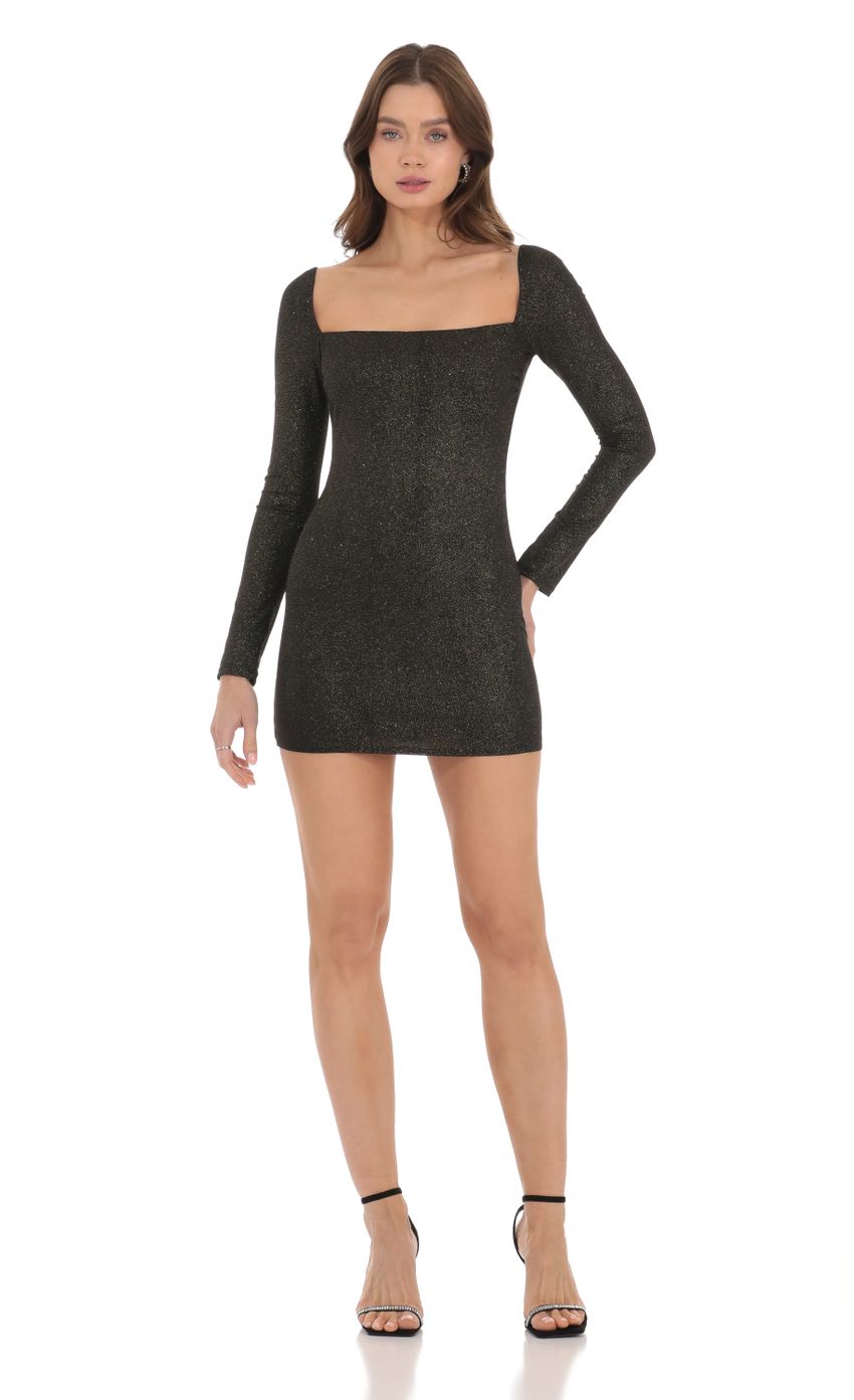 Picture Shimmer Long Sleeve Dress in Black. Source: https://media-img.lucyinthesky.com/data/Dec23/850xAUTO/cadd6330-797f-42dd-b8db-f1ea3db22f57.jpg