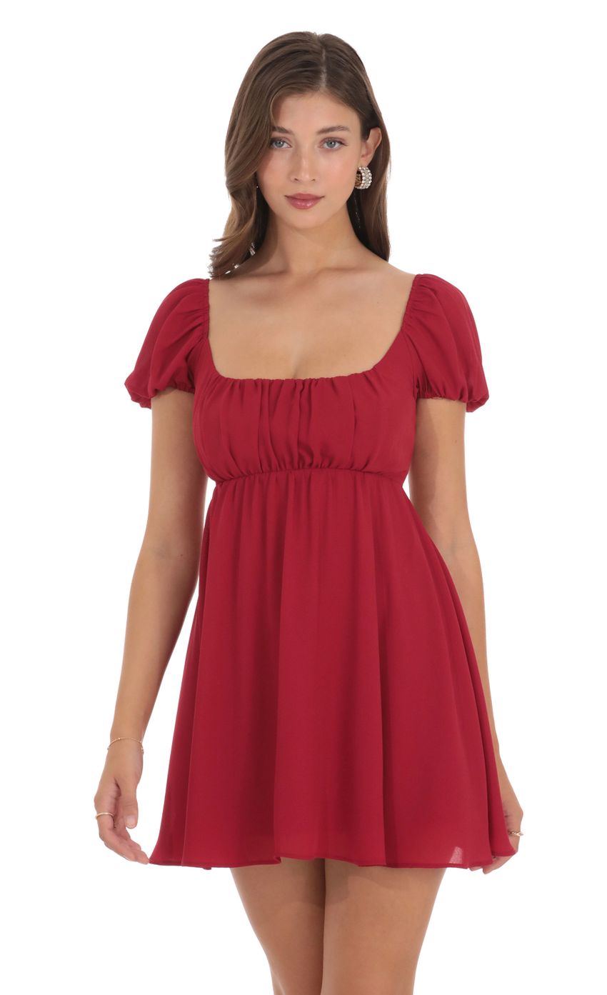 Picture Puff Sleeve Babydoll Dress in Red. Source: https://media-img.lucyinthesky.com/data/Dec23/850xAUTO/d136e9f7-f490-4f24-a5b8-9e3d9b154336.jpg