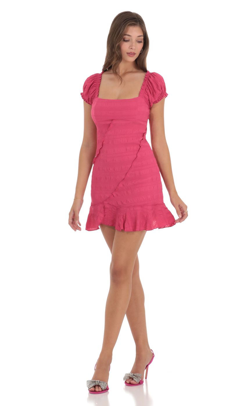 Picture Puff Sleeve Ruffle Dress in Pink. Source: https://media-img.lucyinthesky.com/data/Dec23/850xAUTO/db29d4b4-377c-411b-b3ea-fb81179bb57f.jpg