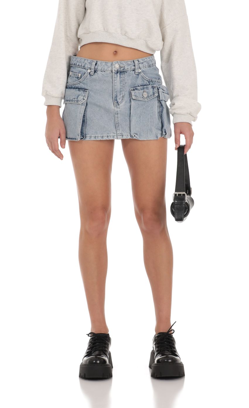 Picture Denim Cargo Skirt in Blue. Source: https://media-img.lucyinthesky.com/data/Dec23/850xAUTO/ea0a6141-67c0-4507-ab32-cb5010b9574f.jpg