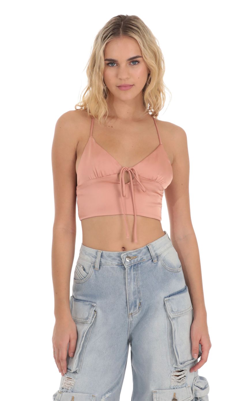 Picture Front Tie Satin Top in Apricot. Source: https://media-img.lucyinthesky.com/data/Dec23/850xAUTO/ffcad209-7204-447d-b42c-4e418b0712a1.jpg