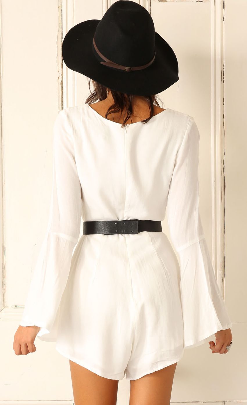 Picture WHITE CUT-OUT NECKLINE JUMPSUIT. Source: https://media-img.lucyinthesky.com/data/Feb15_1/850xAUTO/0Y5A5444.JPG