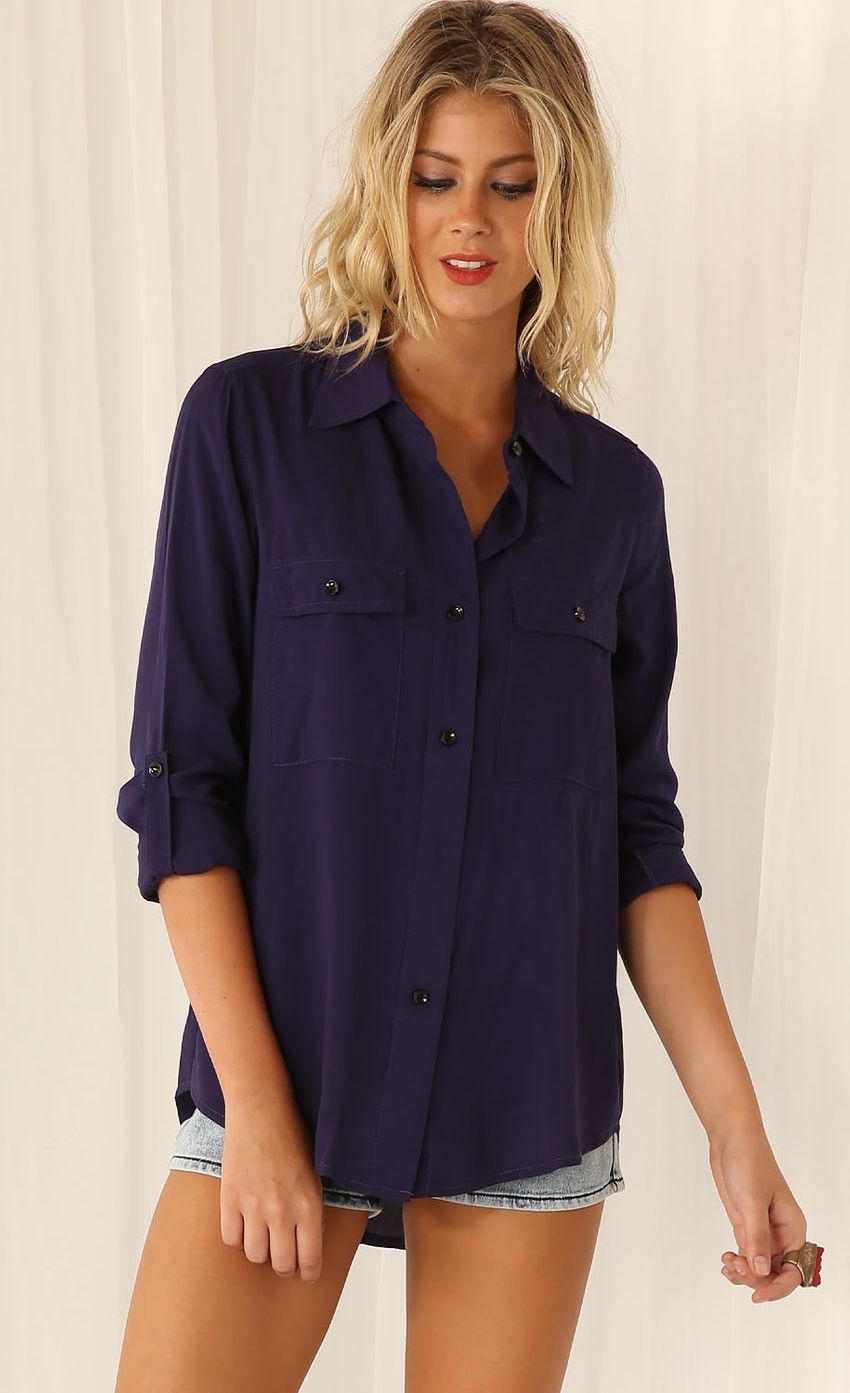 Picture Navy Blue Button-Up Shirt. Source: https://media-img.lucyinthesky.com/data/Feb15_2/850xAUTO/0Y5A0029.JPG