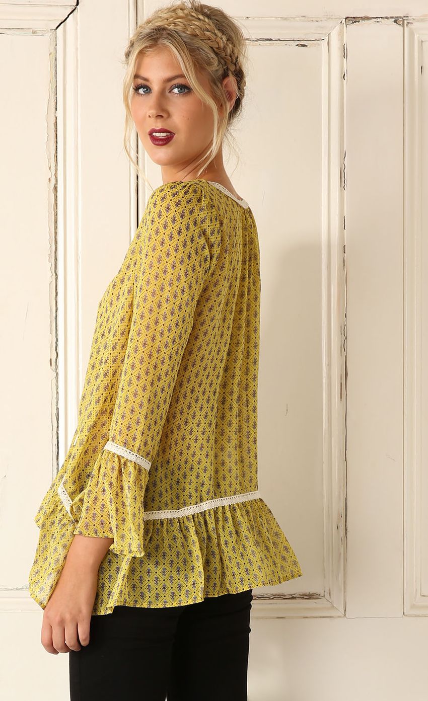 Picture Yellow Paisley Print Chiffon Top. Source: https://media-img.lucyinthesky.com/data/Feb15_2/850xAUTO/0Y5A0361.JPG