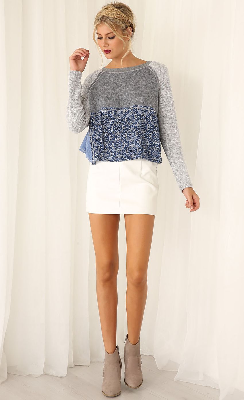 Picture Blue and Grey Panel Knit Top. Source: https://media-img.lucyinthesky.com/data/Feb15_2/850xAUTO/0Y5A0671.JPG