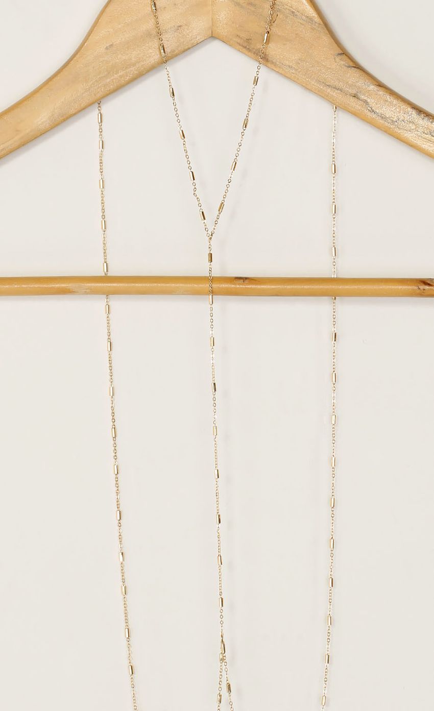 Picture Gold Beaded Bodychain. Source: https://media-img.lucyinthesky.com/data/Feb15_2/850xAUTO/0Y5A7759.JPG
