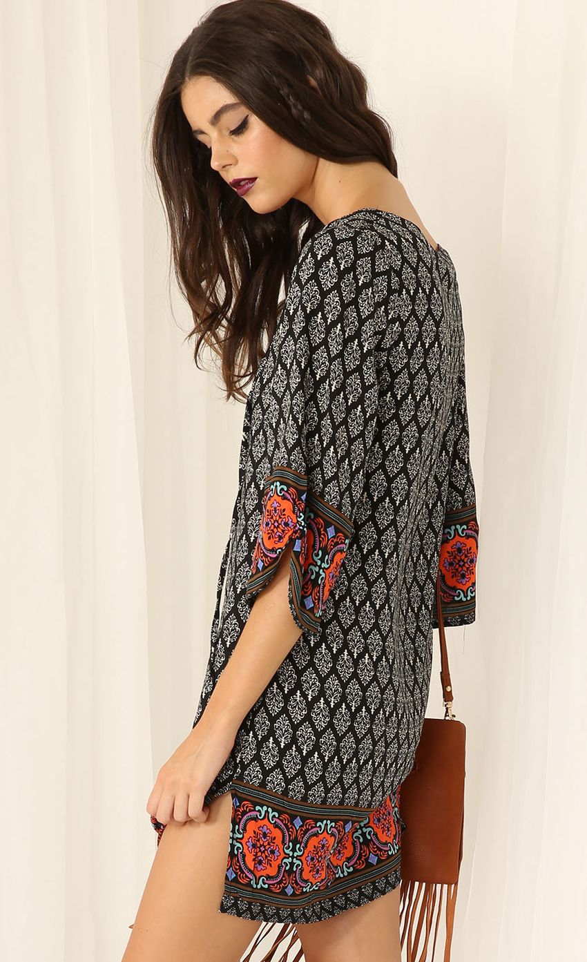 Picture Paisley Print Dress with Popping Hemline. Source: https://media-img.lucyinthesky.com/data/Feb15_2/850xAUTO/0Y5A9788.JPG