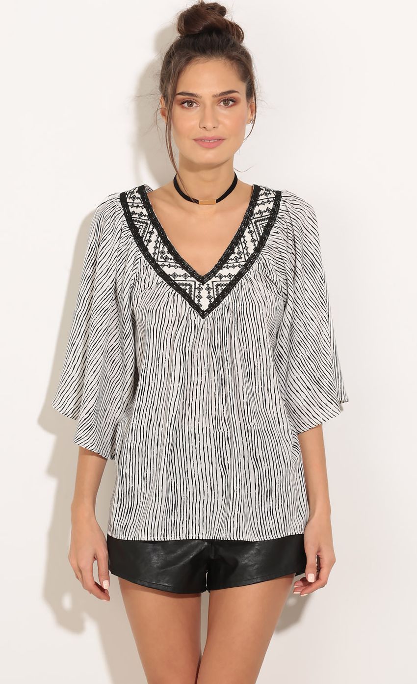 Picture Embroidered Stripe Top In Black. Source: https://media-img.lucyinthesky.com/data/Feb16_1/850xAUTO/0Y5A0705.JPG